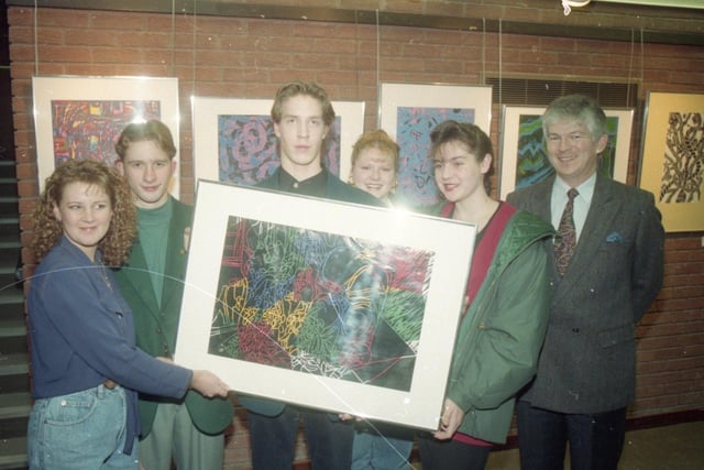 Young artists from a Lancashire school have been invited to display their work in a university exhibition. Preston's University of Central Lancashire has invited talented pupils from Carr Hill High School in Kirkham to put on a display, sponsored by Midland Bank. From left, Carr Hill students Claire Fieldhouse, Daniel Maddock, Nathan Holtappel, Carolyn Baker and Claire Devaney, with Midland Bank area manager Chris Hurley
