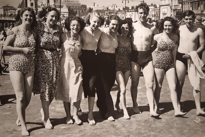 A typical scene of friends at the beach in Blackpool 1958