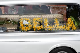 Yellow roses spell out the name of a 'kind and bubbly' Bella