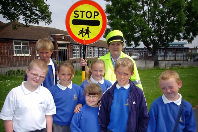 After a six-month long campaign in 2006, pupils at Flakefleet School in Fleetwood had a crossing patrol. Lollipop lady Avril Bairstow with some of the pupils.
