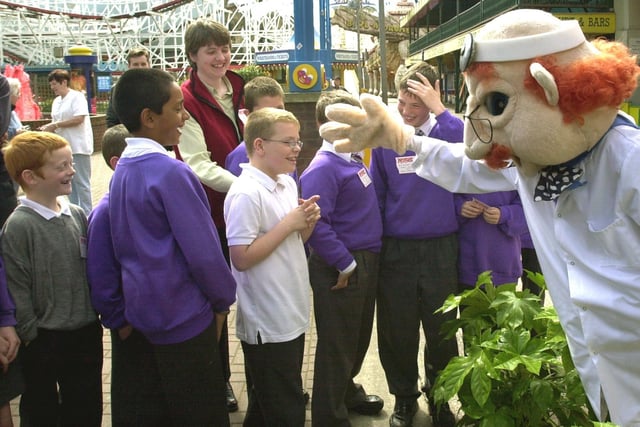The crazy doctor meets pupils of Thames School at the opening of the new ride Impossible at Blackpool Pleasure Beach