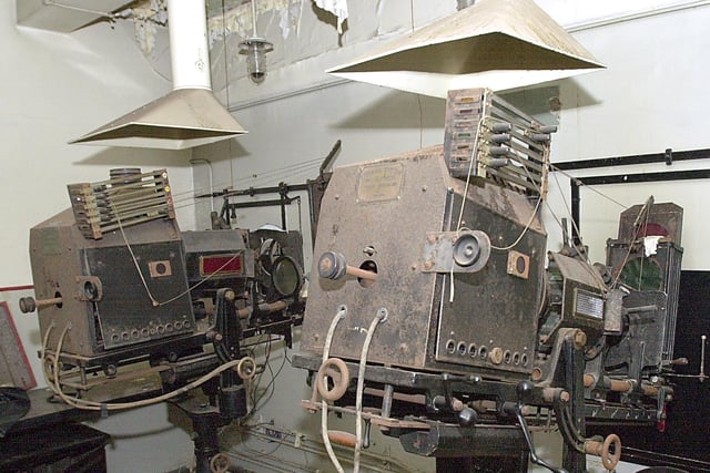 This photo shows the projectors standing idle after a lifetime's work. They were uncovered when the building was being converted into Funny Girls