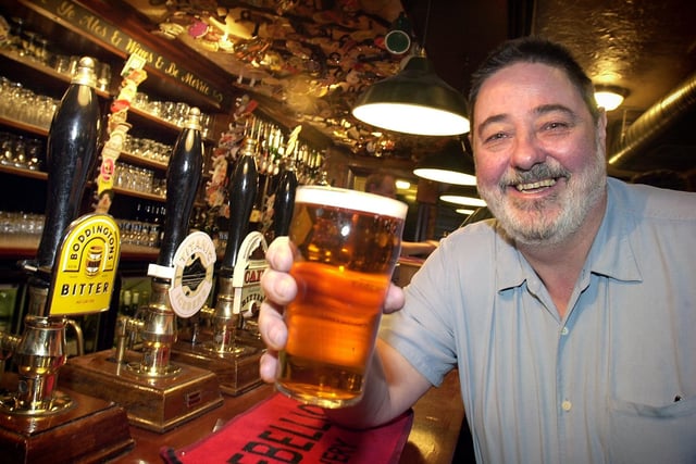 Landlord of The Taps Ian Rigg celebrates in appropriate fashion after CAMRA awarded the Lytham pub 'Best In England', and only one point off the overall trophy in 2003