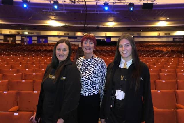 Lynda Baker with staff members at the Winter Gardens