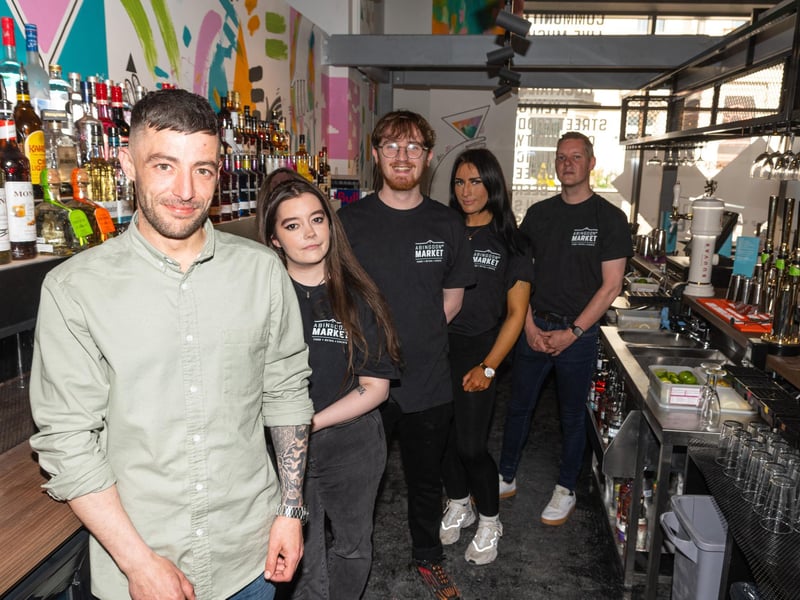 Staff at The Public Bar inside Abingdon Street Market ready for the big re-opening