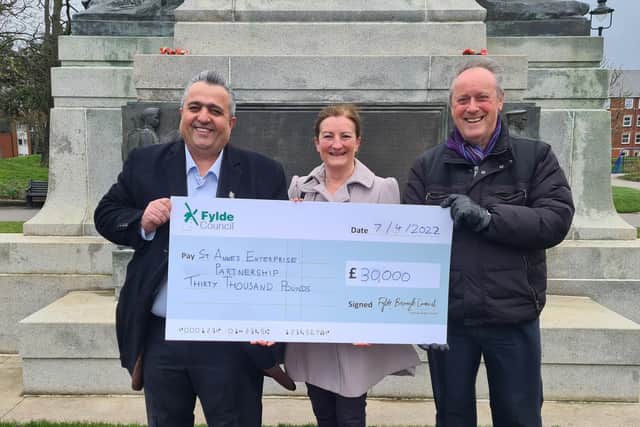 St Annes Enterprise chairman Veil Kirk (left) and vice-chairman Aileen Ames are presented with an Additional Restrictions Grant cheque for £30,000 by Fylde Council's deputy leader Coun Roger Small