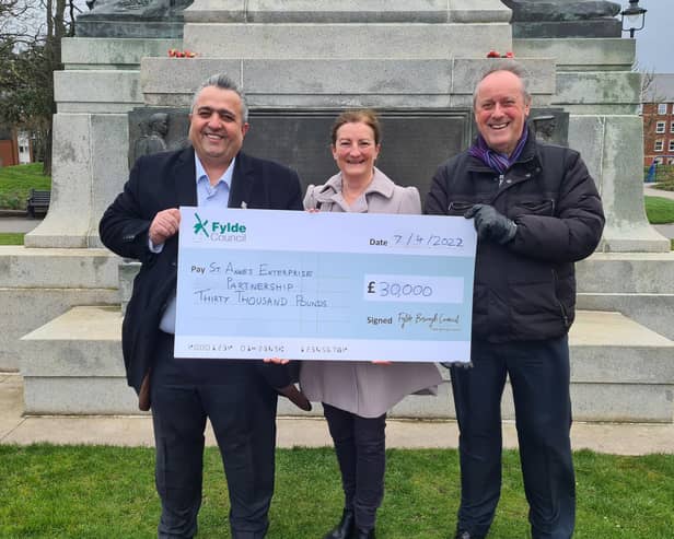 St Annes Enterprise chairman Veil Kirk (left) and vice-chairman Aileen Ames are presented with an Additional Restrictions Grant cheque for £30,000 by Fylde Council's deputy leader Coun Roger Small