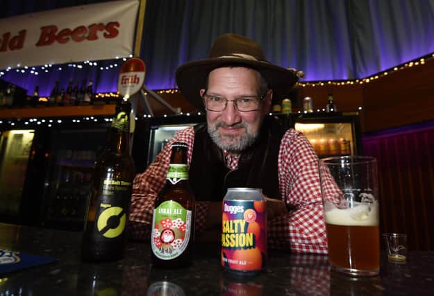 Rob Wheatley with a selection of world beers on offer at the festival.