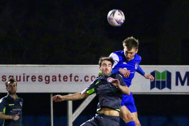 Chris Webster climbs highest for Squires Gate against Vauxhall
