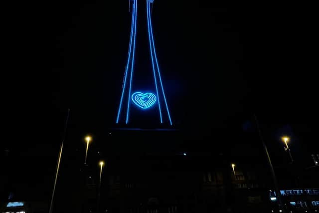 Blackpool Tower and Fleetwood's Marine Hall lit up in blue on Monday