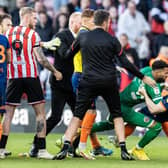 Lavery was taken to the ground by Wes Foderingham after the final whistle on Saturday