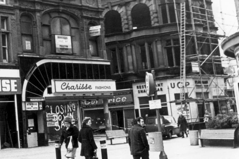 Charisse Fashions and United Cattle Products (UCP) being demolished to make way for a new Boots store in 1976 in Bank Hey Street