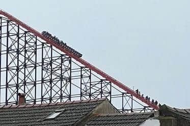 Guests were guided off the ride and escorted down the red emergency stairs – over 400 steps – to safety. Picture by Gordon Head