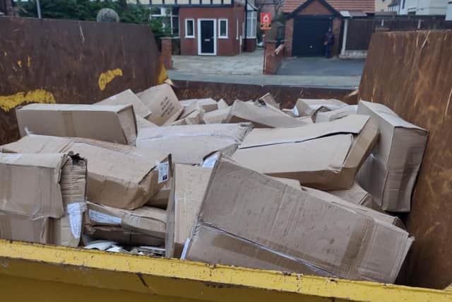 The boxes of water-damaged aprons in the skip on the driveway at the former Rosewood Lodge Care Home.