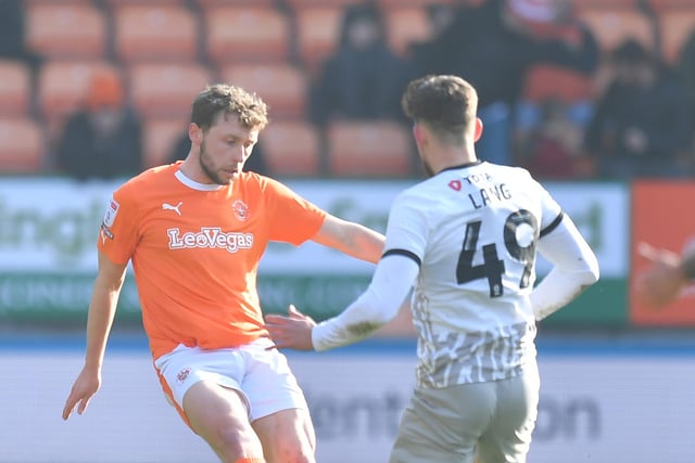 Matthew Pennington and the Blackpool defence battled hard throughout, working well as a unit to keep Portsmouth out.