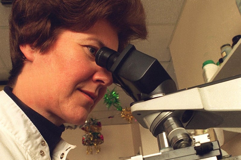 Medical Laboratory Scientific Officer Susan Crackles examining blood films