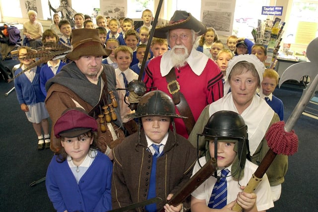Local Sealed Knott re-enactment members Sid and Hazel Westwell (right) and Mike Seed brought English civil war history to life at Garstang Discovery Centre for Abigal Walmsley, aged eight, Daniel Banks (10) and James Gaughan (nine), and fellow SS Mary And Michael RC School pupils
