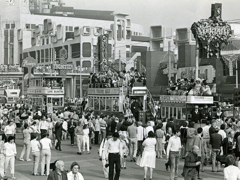 A view of the promenade crowds and historical trams near Coral Island during the Tramway Centenary celebrations in 1985