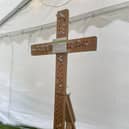 Prayers are placed in a special wooden cross at the 2024 event