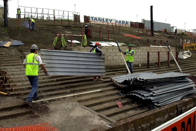 Progress was being made to demolish the Kop. Corrugated sheeting was being removed as the old stand came down piece by piece