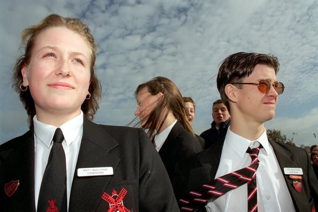 This photo is from 1998 when Millfield High appointed an anti-bullying squad made up of prefects, to patrol the schoolyard and classrooms.
Three of the squad are on the look-out -  Deputy Head Girl Charlotte Halstead, Roxanne Barker, and David Stansfield who were all 15