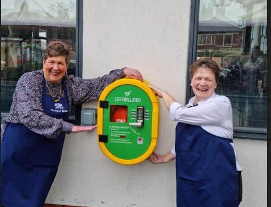 Jan  Penn  and Ann  Saxelby from the  Half Way House Pub in Blackpool  with their defibrillator