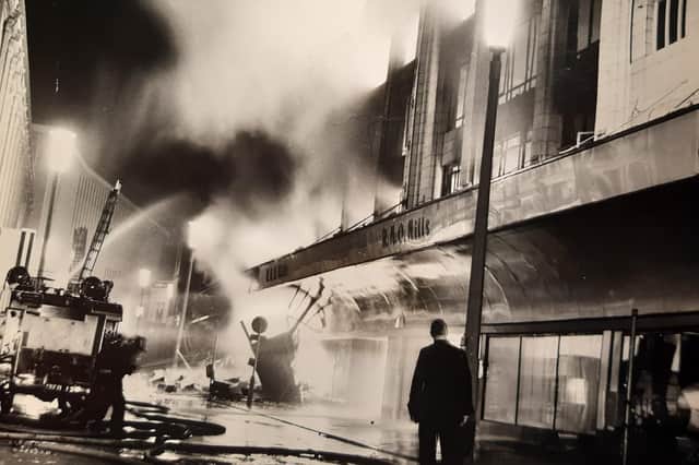 Flames leap through the roof and windows on the Bank Hey Street side of R.H.O Hills at the height of the blaze