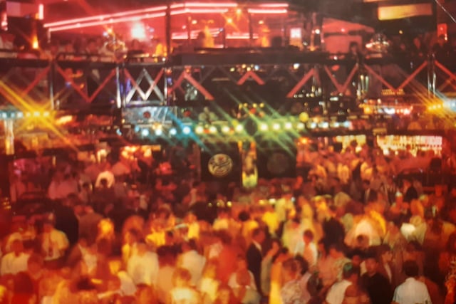 This shows the scale of the club, it's two levels, packed dancefloor and some of it's famous light rigging