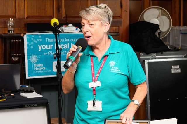 Janet Atkins from Trinity Hospice gives a speech of thanks at The Steamer Pub in Fleetwood after a karaoke group, which runs sessions on Tuesdays and Fridays, with a bucket collection, has raised an impressive £5,000 for Trinity Hospice. Photo: Kelvin Stuttard