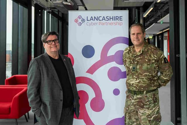 Andy Walker, chief exceutive of the Lancashire Enterprise Partnership, welcomes Lieutenant General Tom Copinger-Symes CBE, Deputy Commander, UK Strategic Command, to the county for the launch of the Lancashire Cyber Partnership