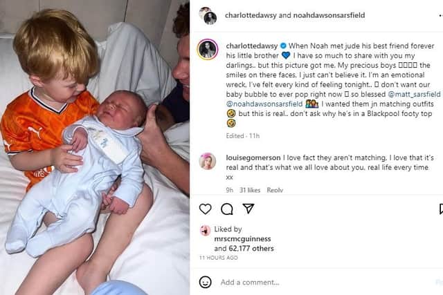 Charlotte shares a post about her two son's first meeting.