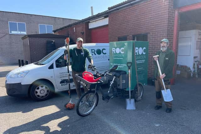 James Baker (Project Development Manager) (left) with Chris Young (Gardener and Mechanic) (right) proudly showing off their new transport up against one of their existing vans