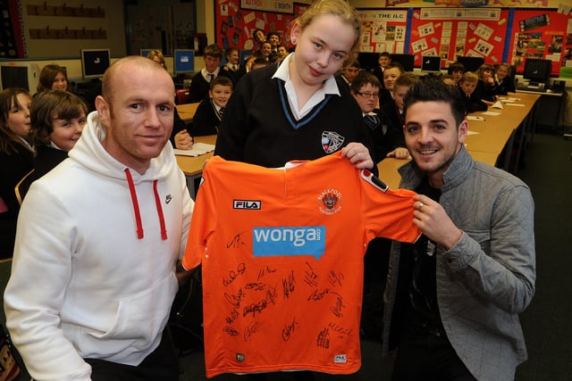 Pupils at Millfield High School in Thornton took part in a Readathon, and were given a signed Blackpool FC shirt from the club to help with the fundraising