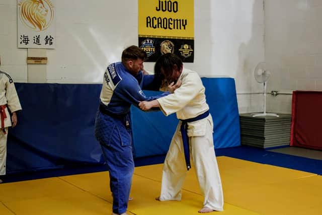 Rox Casson (right) during the 100 combats judo challenge.