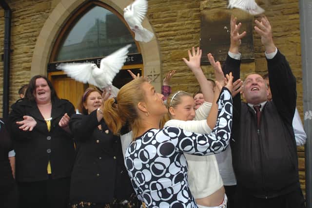 A memorial service for Charlene Downes took place at St John's Church in Blackpool and are doing another one for her 20th anniversary.
Robert Downes (far right), family and friends release four white doves after the service. PIC BY ROB LOCK