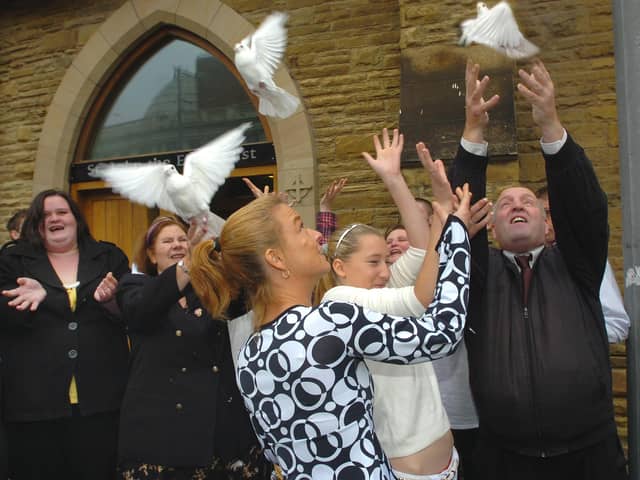 A memorial service for Charlene Downes took place at St John's Church in Blackpool and are doing another one for her 20th anniversary.
Robert Downes (far right), family and friends release four white doves after the service. PIC BY ROB LOCK