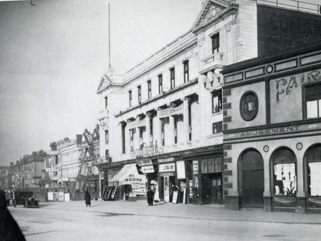 This was fairyland at the junction of Central Promenade and Chapel Street in 1925. The building with the white facade once housed at different times a cafe area, hall, shops and the Ritz Cinema