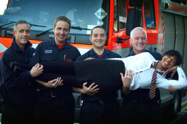 Staff and students of Blackpool and the Fylde College hairdressing and beauty course were joined by St Annes Firefighters to raise money for Children In Need. Davina Doherty is given a special fireman's lift by (left to right) Darren Young, Warren Topp, Paul Rigden, and Ray Bird