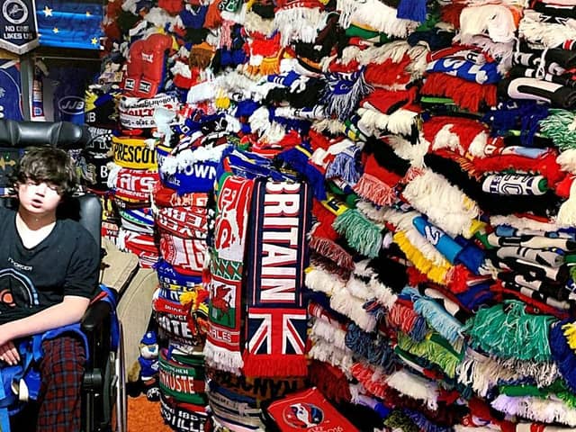 Football is one of Alfie's passions and he has a lot of scarves from all over the world