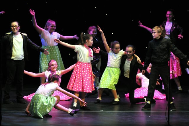 Hawes Side Primary Academy on stage at the Winter Gardens performing songs from Grease