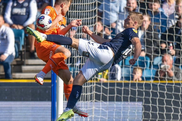 Jordan Thorniley makes a block to deny Zian Flemming