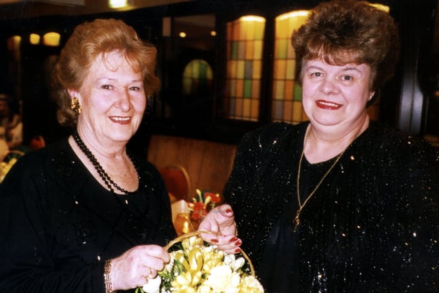 Mrs Doreen Woods seen presenting flowers to Miss Marilyn Wilson, chairman of the Blackpool & Fylde Light Operatic Company at the Annual Dinner and Dance