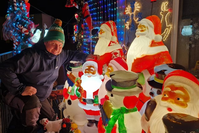 Dean Thomas of 72 Condor Grove, pictured with his Christmas lights display
