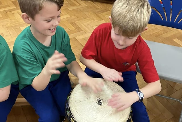 Pupils in Blackpool schools try African drumming at a workshop organised by Blackpool Music Service