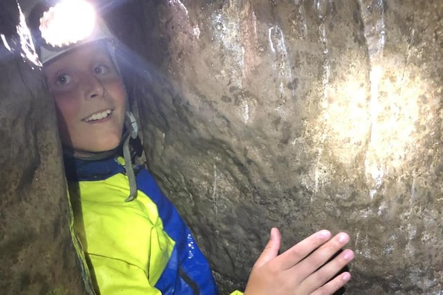 Exploring Yordas Cave during the AKS school trip to Ingleton