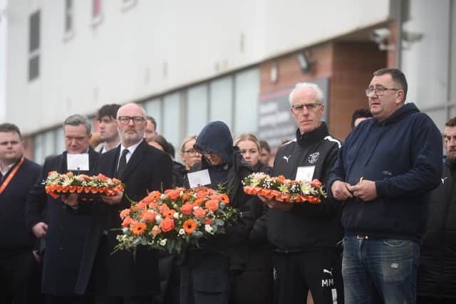 Mick McCarthy and club hierarchy were among those to lay wreaths on Monday afternoon