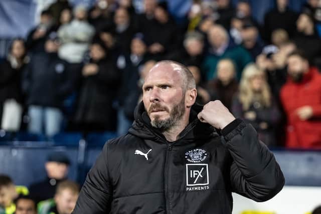 Michael Appleton's side take on fellow strugglers Wigan in a huge six-pointer this afternoon