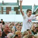 Someone's enjoying the buzz of the festival back in 2011- is this you?