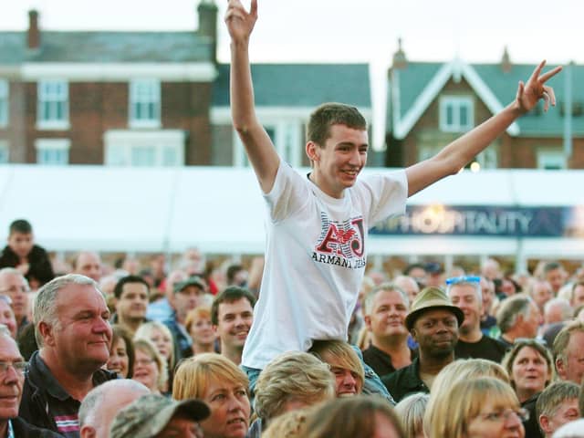 Someone's enjoying the buzz of the festival back in 2011- is this you?
