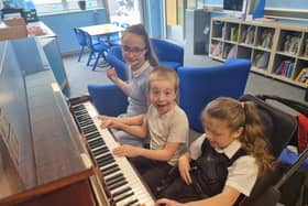 Highfurlong pupils having a great time at the piano
